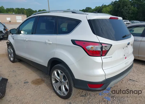 2017 Ford Escape Titanium z USA, uszkodzony, nr VIN 1FMCU0J94HUC92556